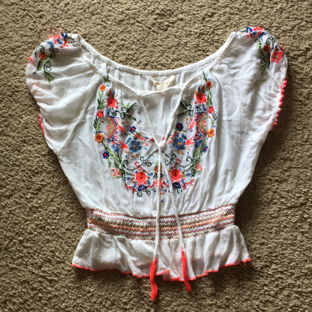 White ruffled flower detailed top